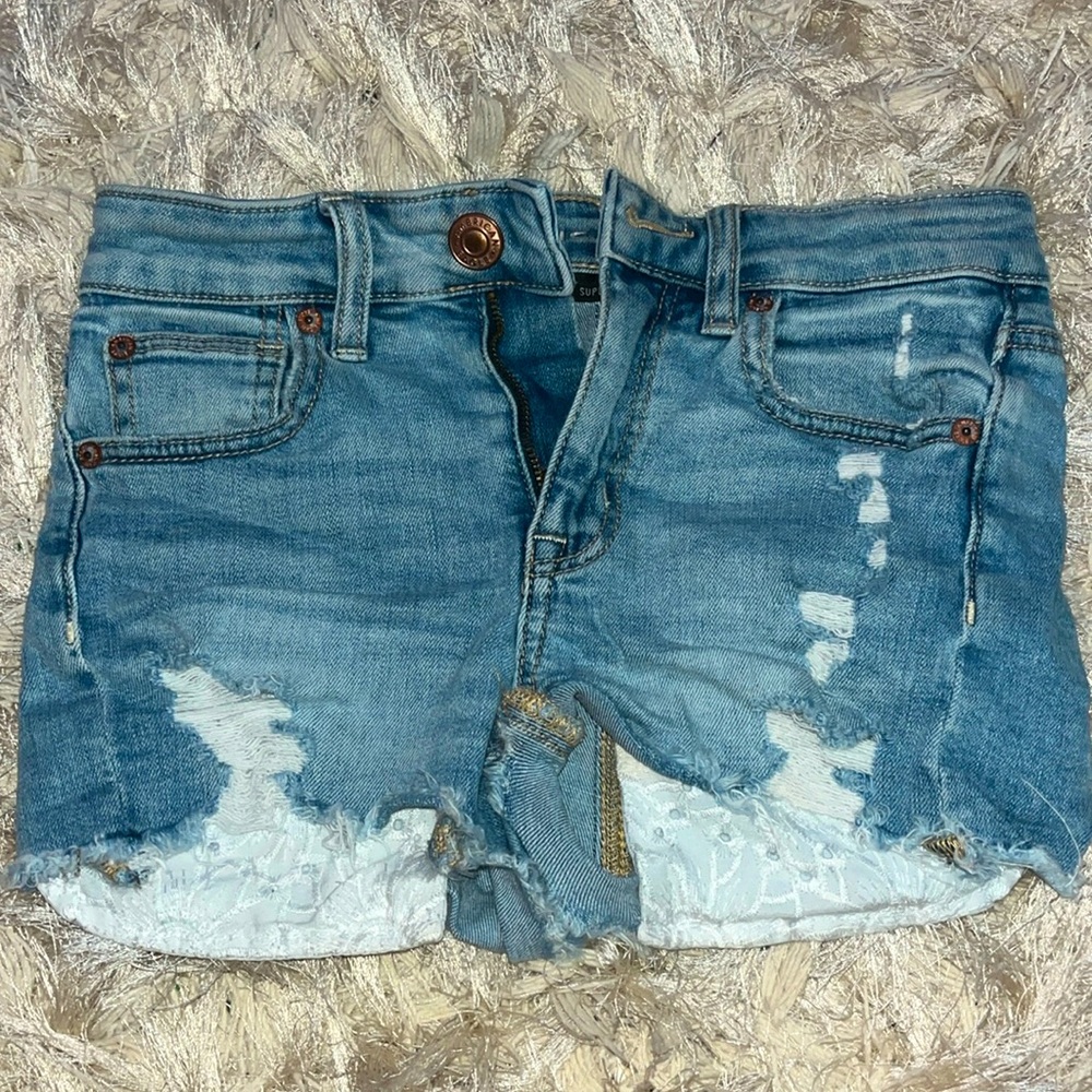 Light blue ripped American Eagle jean shorts